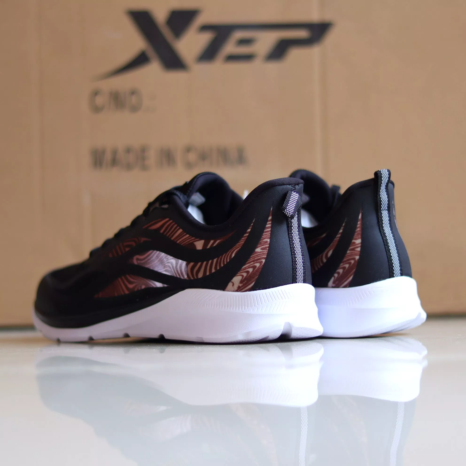 X52 - Women's Medicated Running Shoe by Xtep