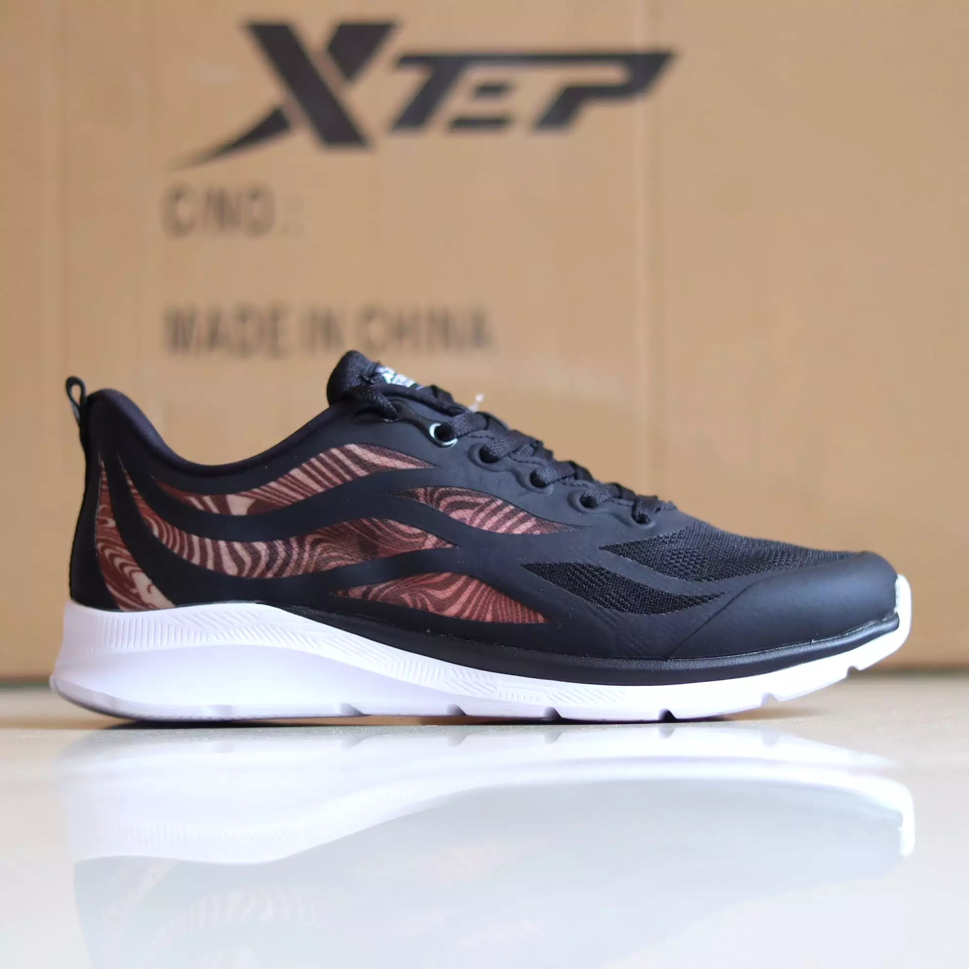 X52 - Women's Medicated Running Shoe by Xtep